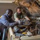 Changing the engine oil at a gas station in Cameroon - the attendant played with his phone until the camera came out